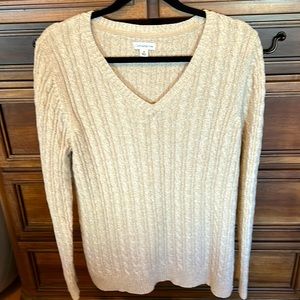 Pretty taupe color sweater size m very nice design in the sweater,
